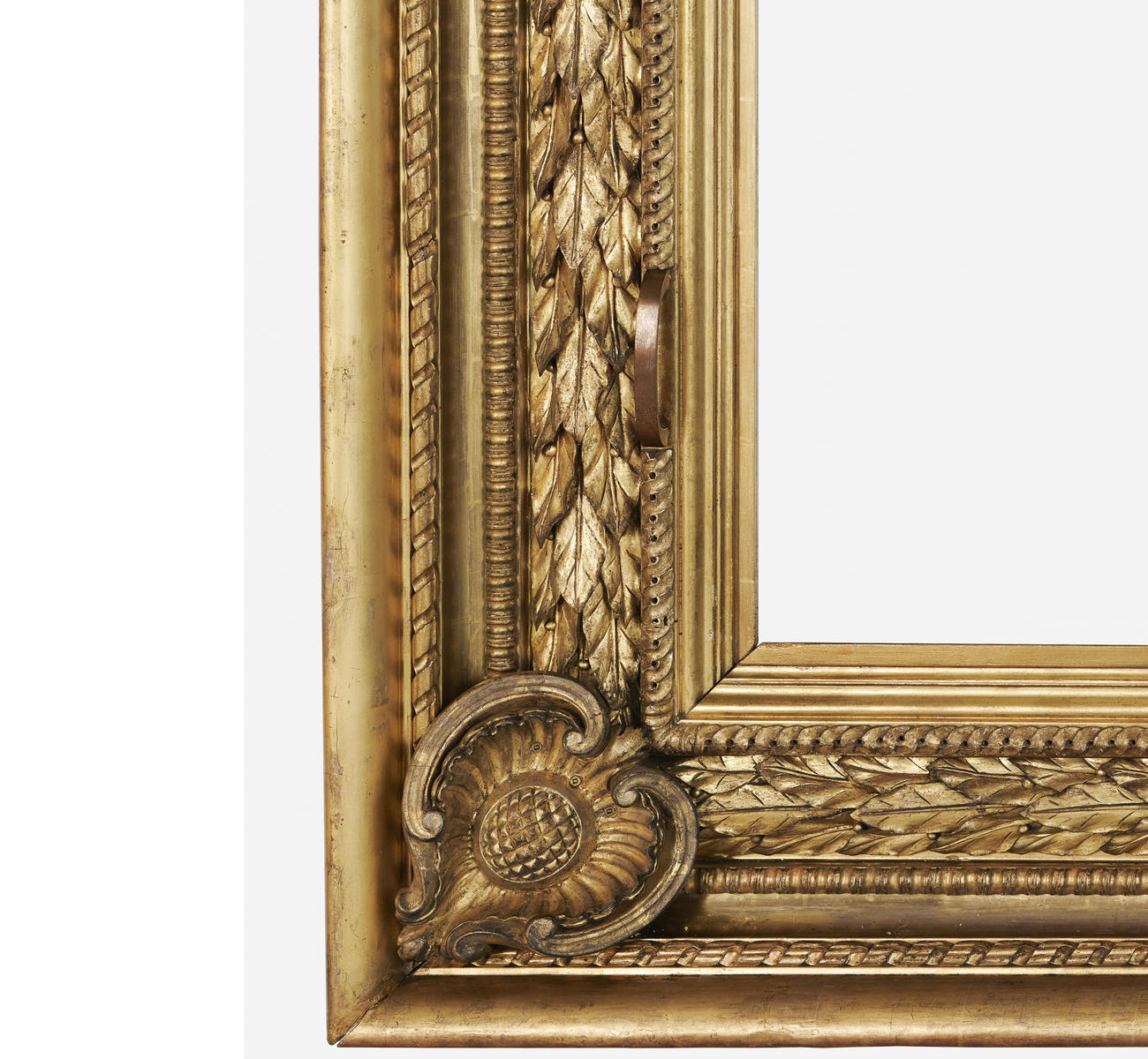 A corner of a gold frame. 