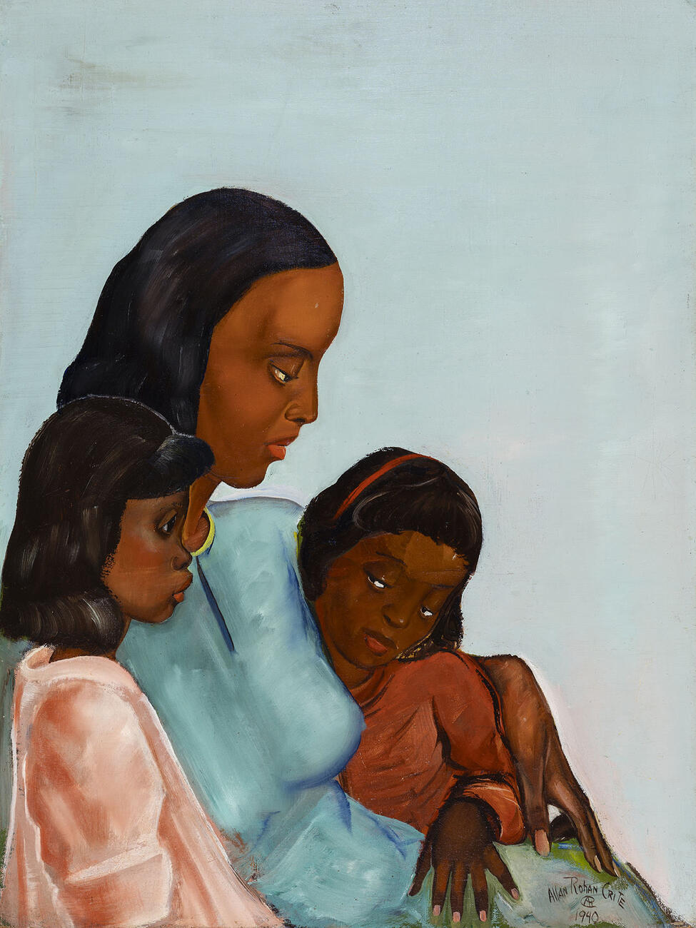 A Black woman in a blue dress is seated with a child on either side in front of a flat blue background.