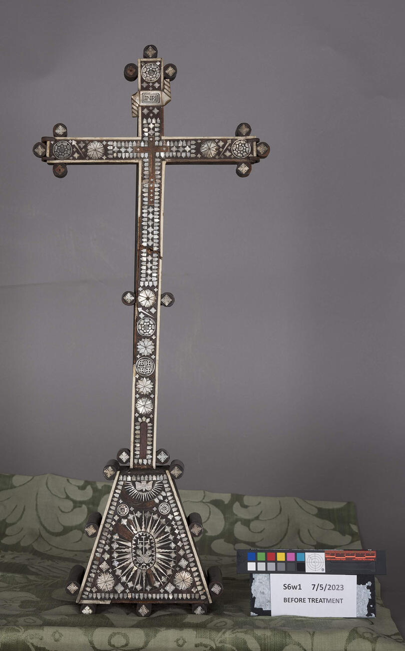 Before treatment photography shows areas of loss on the mother-of-pearl and bone detailing  and after treatment photography shows fills in the areas of loss. 