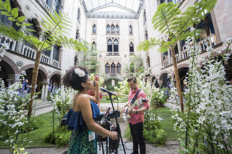 Performance by singer Alea in the Museum's courtyard during August 2016 Neighborhood Nights event. Photo by Matt Teuten.