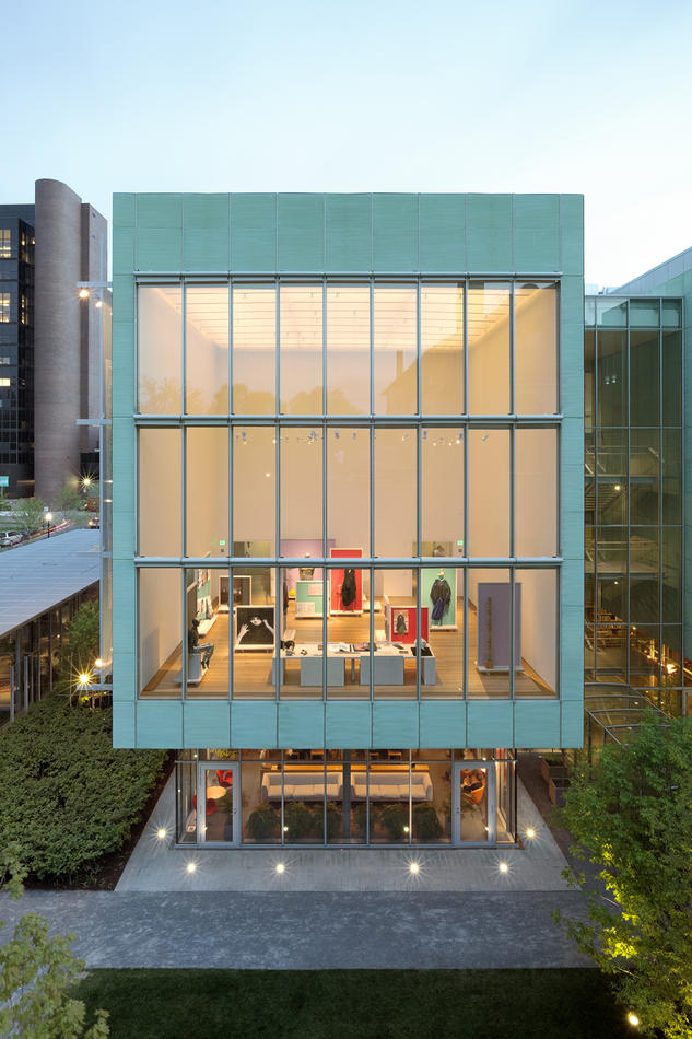 View of Carla Fernández: The Barefoot Designer exhibition from the exterior of Hostetter Gallery