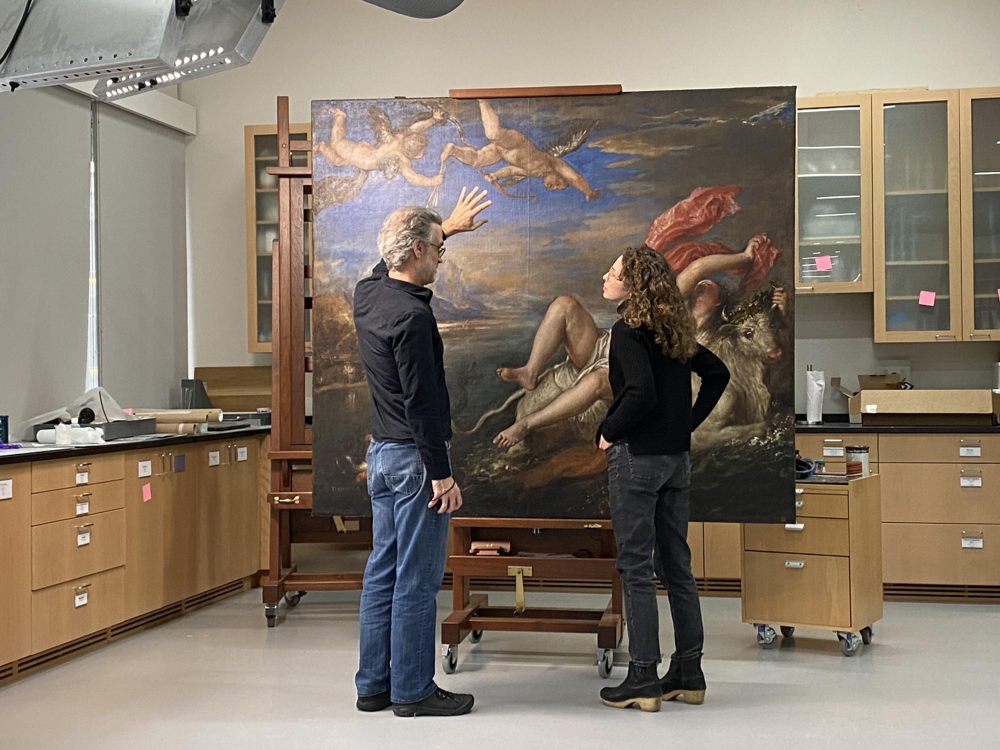 Mary Reid Kelley and Patrick Kelley inspecting Europa painting