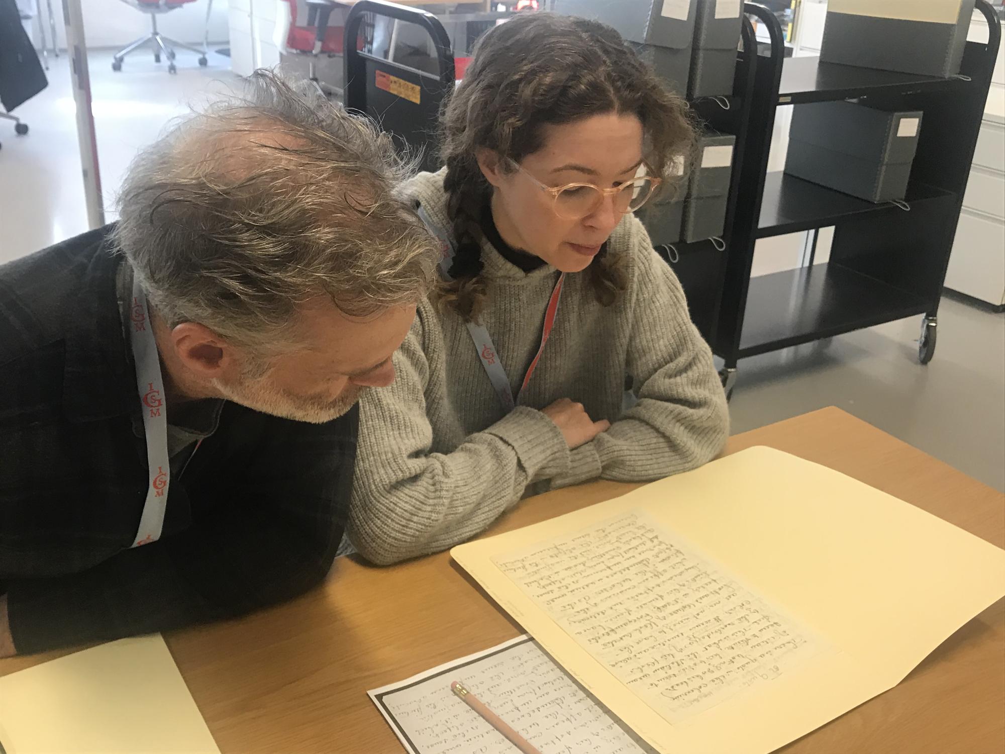 Mary Reid Kelley and Patrick Kelley in the archives, 2019