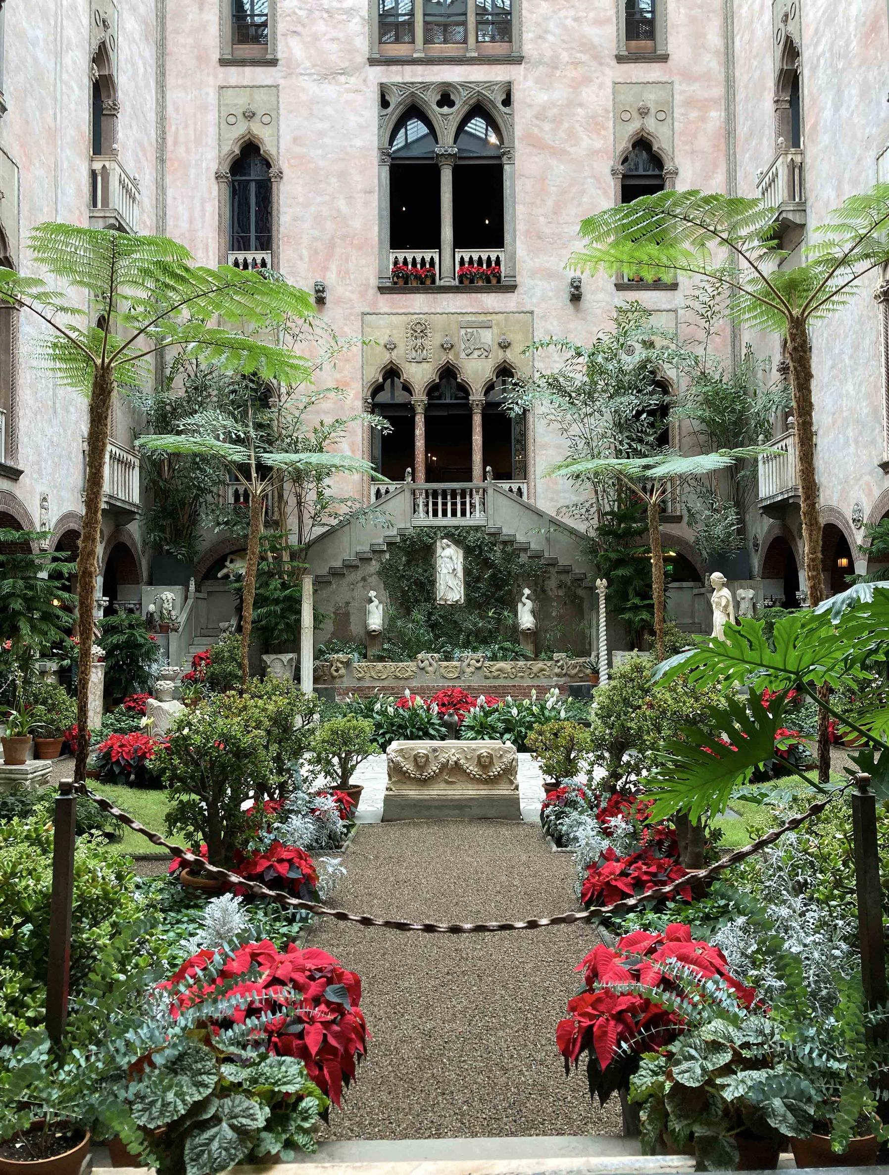 The festive Courtyard in December features flowering jade, juniper and poinsettia. Crimson, velvet amaryllis emerge from nests of fir, pine and magnolia.