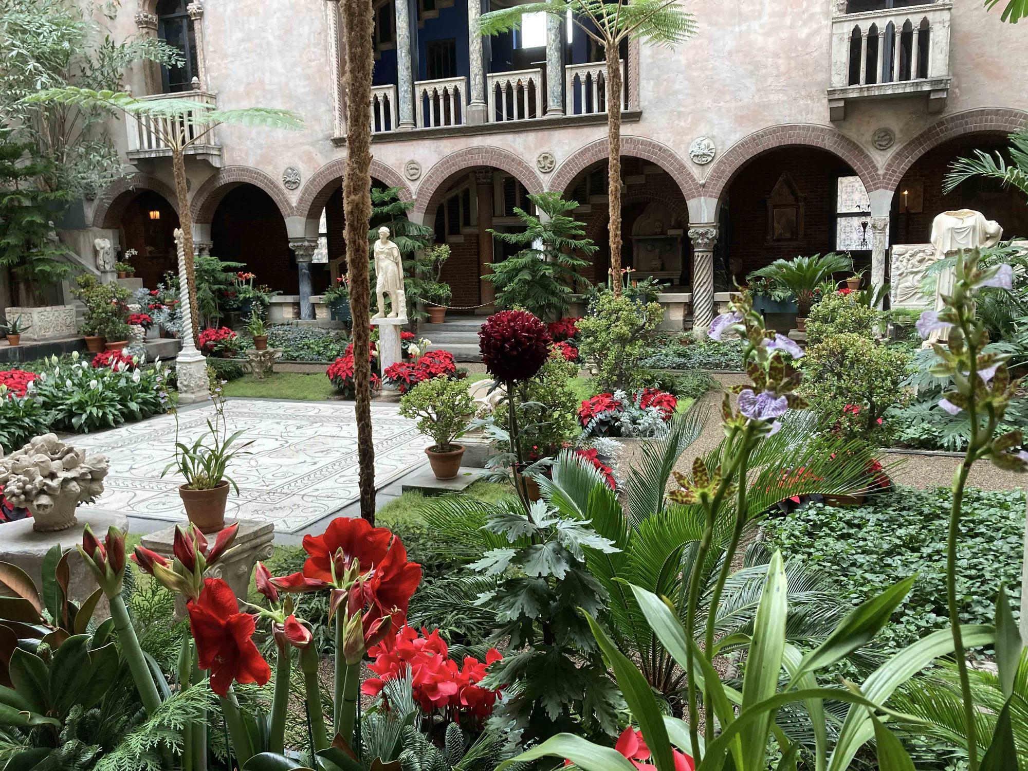 The gardeners adorn this lush holiday garden with jewel-like cyclamen and sweetly-scented Zygopetalum orchids.