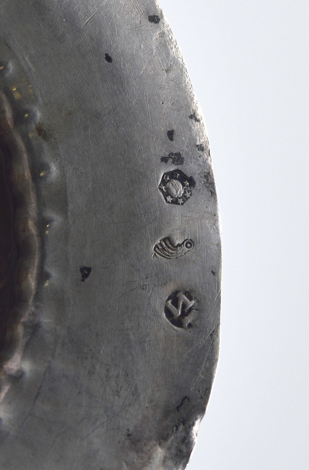 Detail of the bottom of 17th century Italian Spice Holder showing hallmarks and maker’s mark