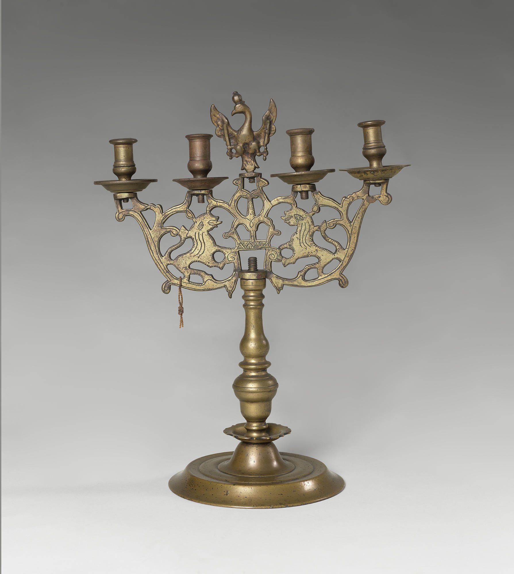 A gold  candlestick holder