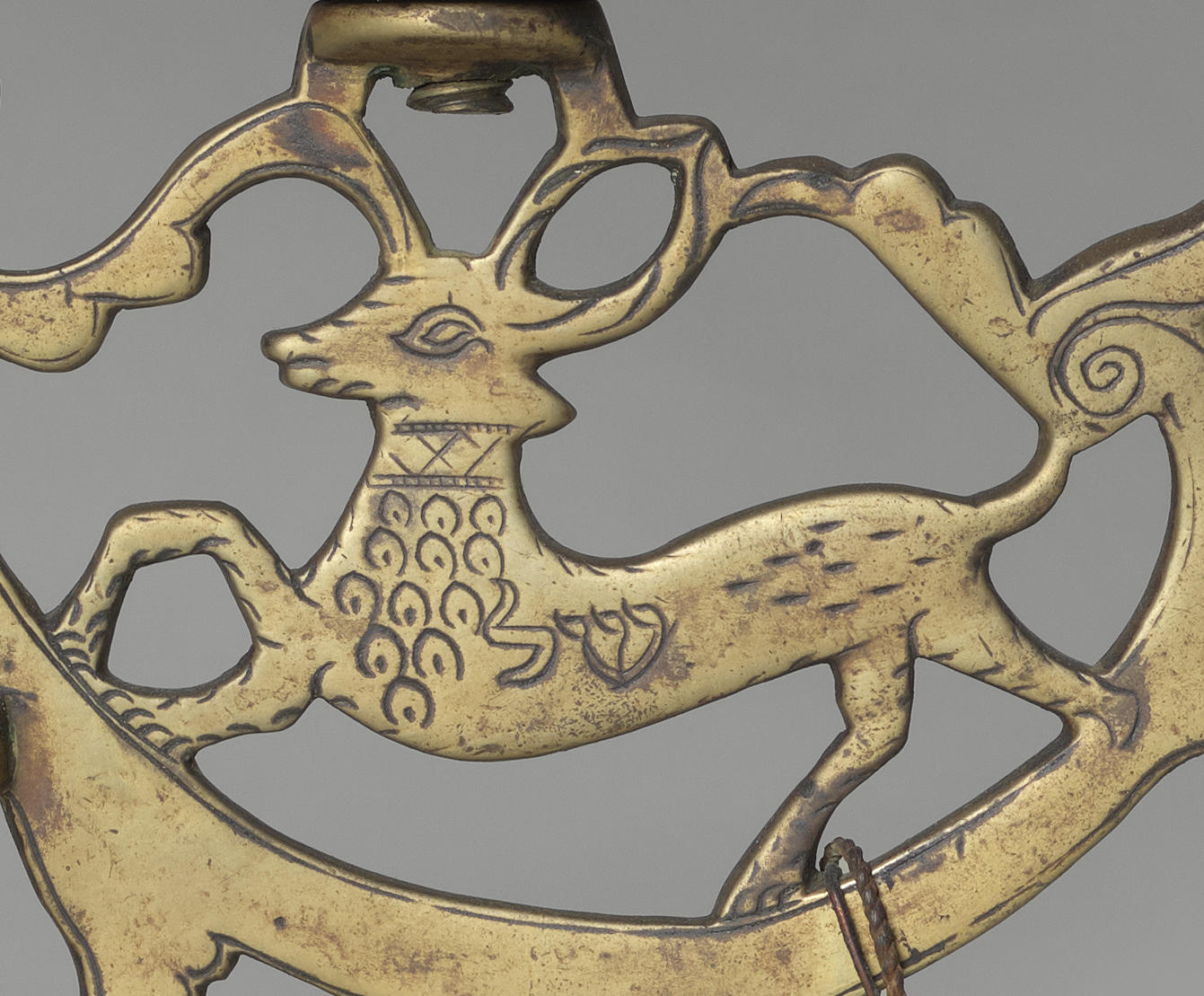 A golden deer on a candelabra