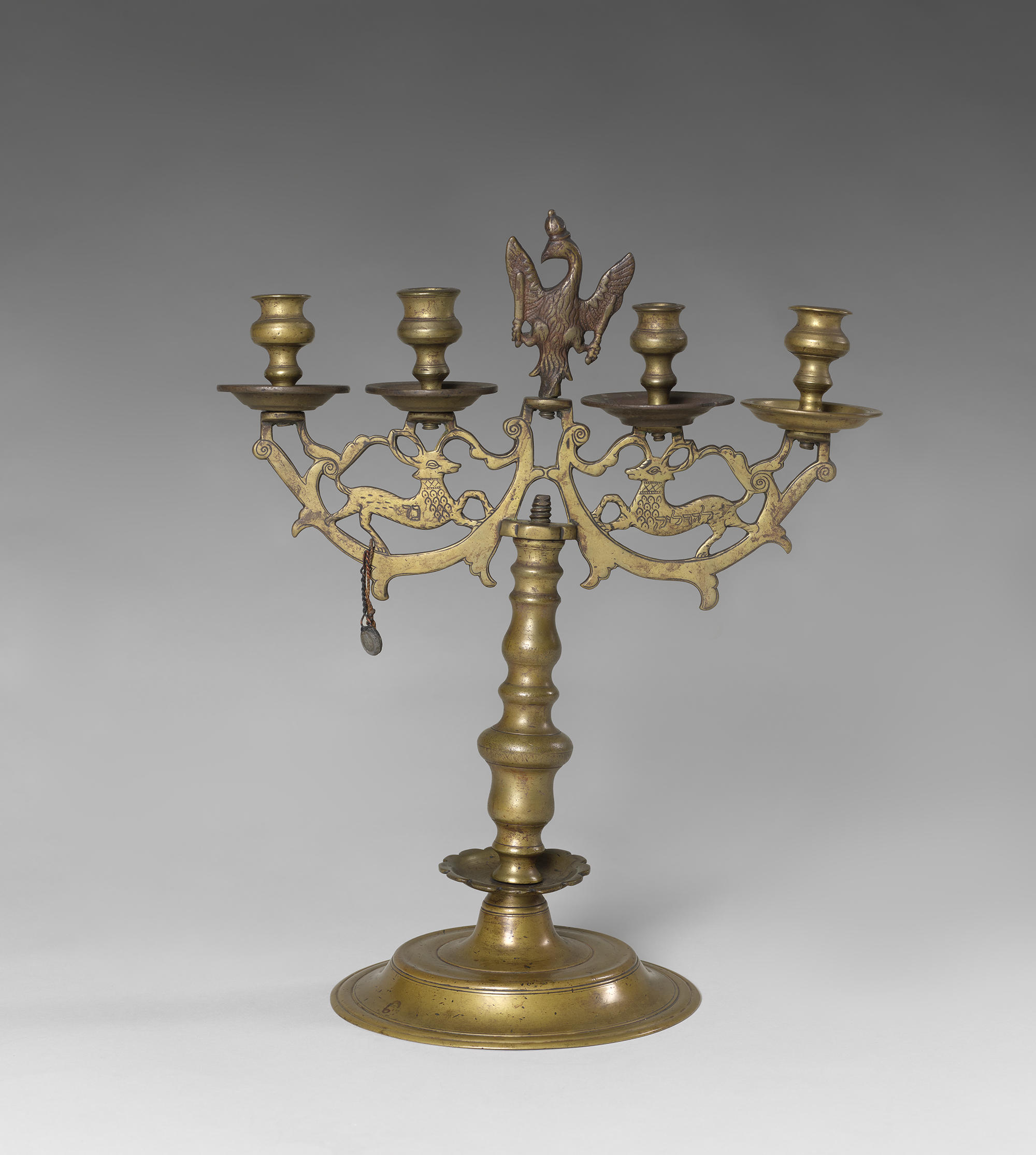 A gold  candlestick holder