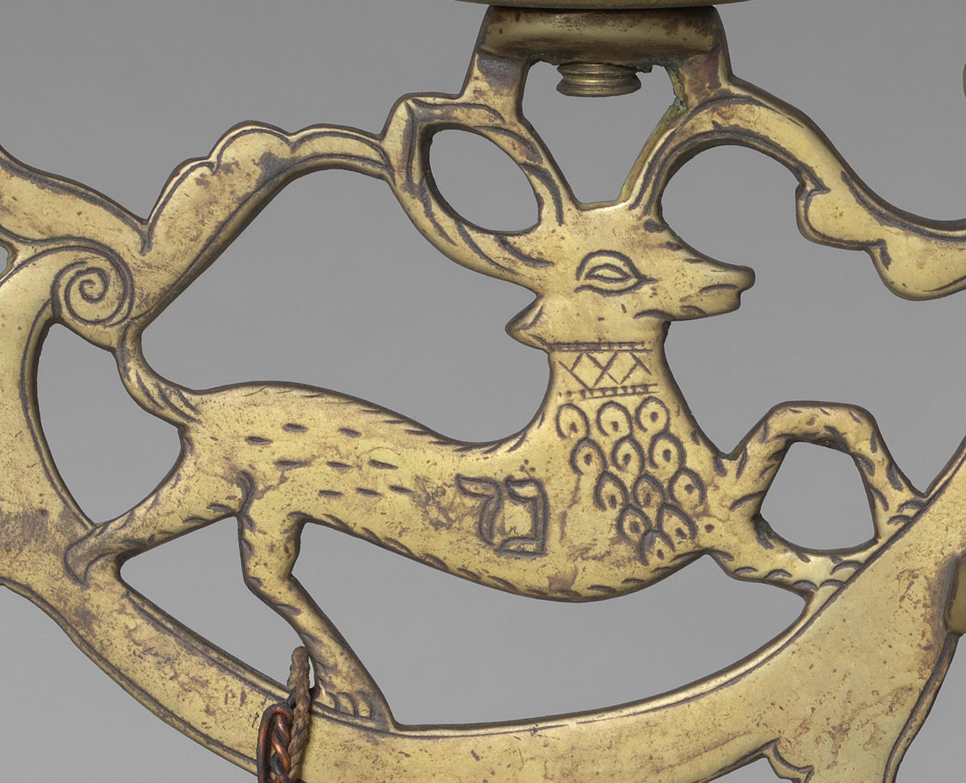 A golden deer on a candelabra