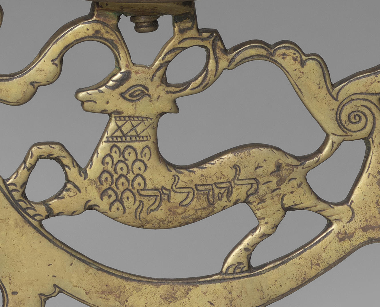 A golden deer on a candelabra