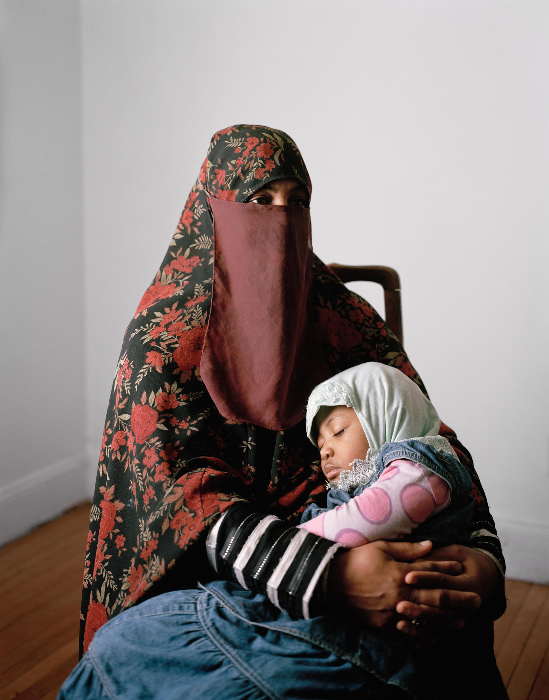 A mother with a niqab and her daughter.