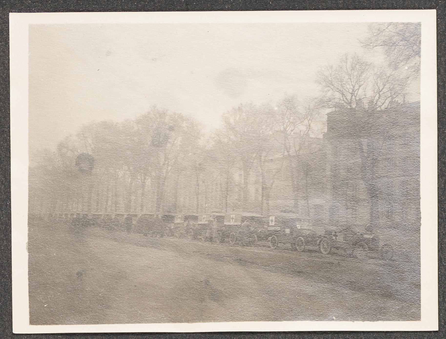 A line of ambulances in France from WWI.