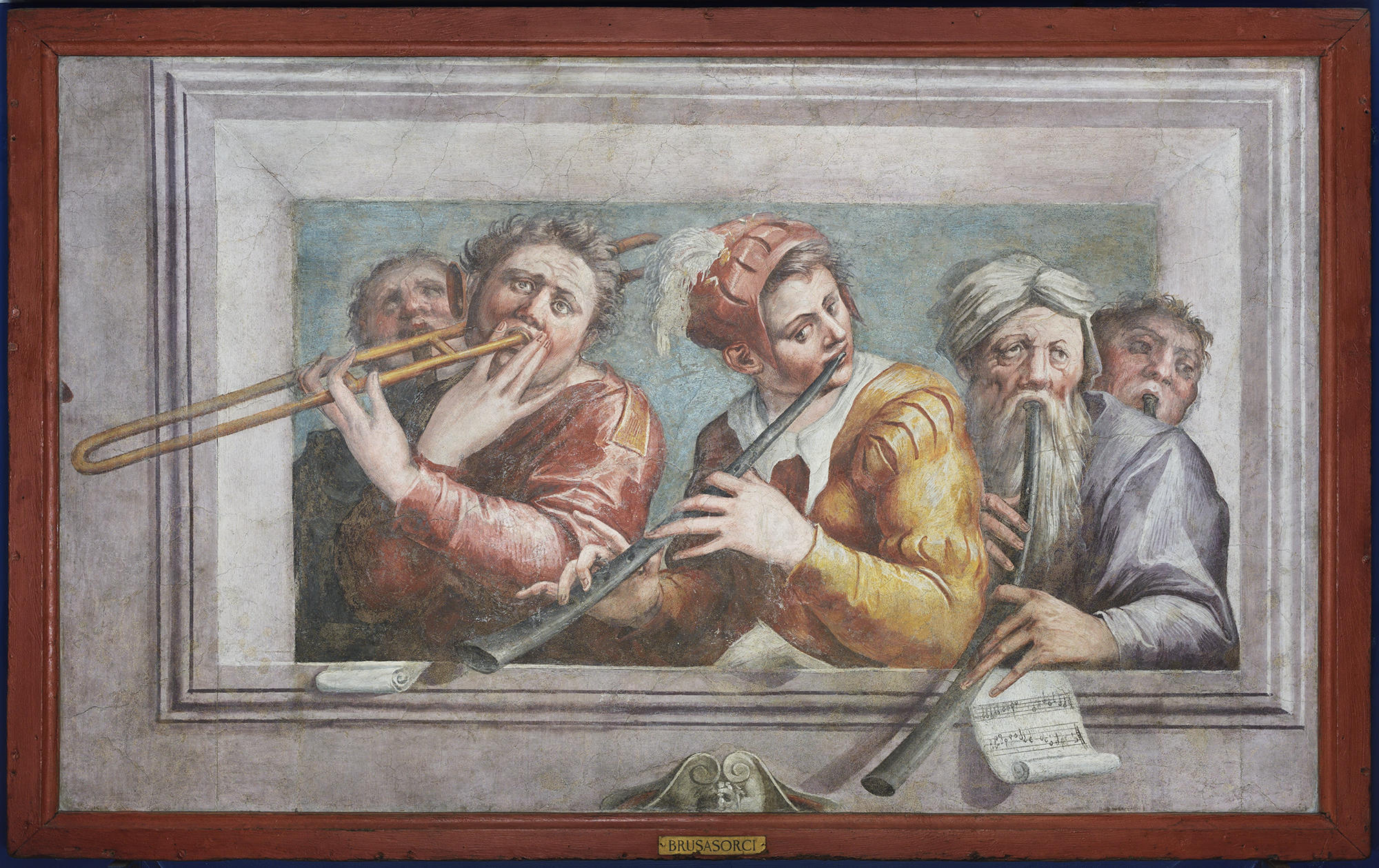 A fresco of three musicians playing wind instruments.