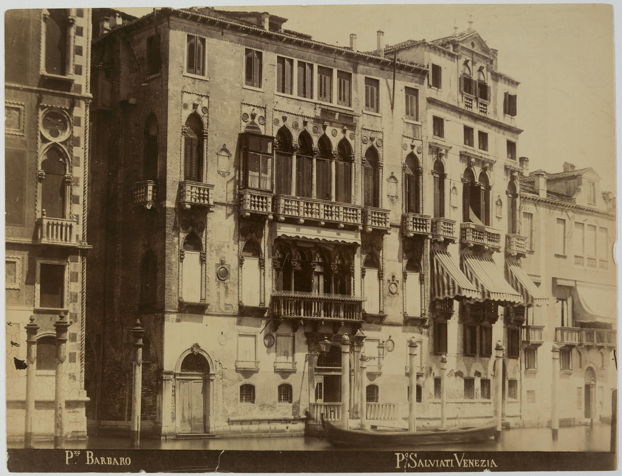 black-and-white photograph of the facade of Palazzo Barbaro, taken from the Grand Canal. 