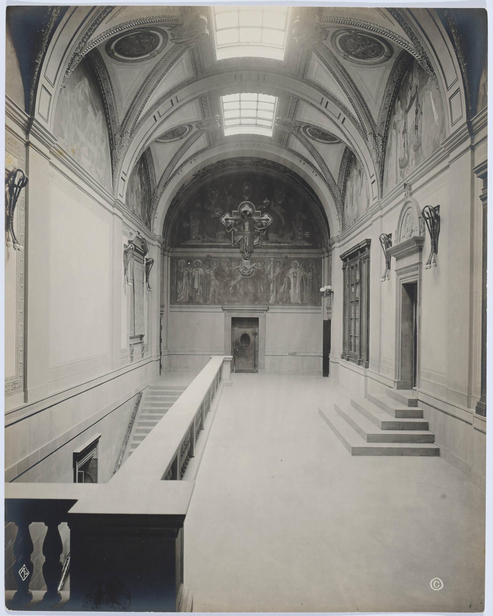 Black and white photographic print showing a room view of the Boston Public Library.