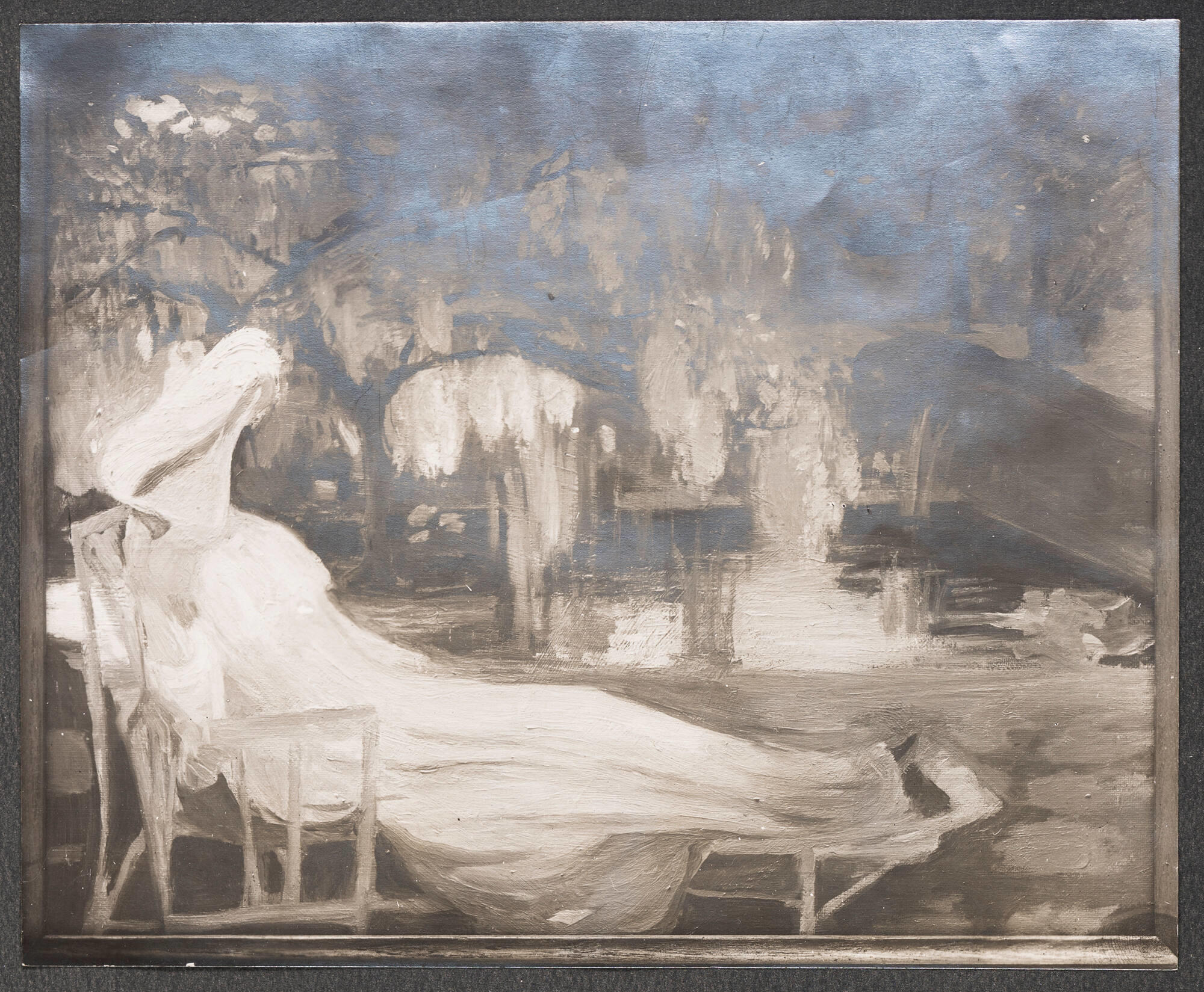 Black and white photograph of a painting of Isabella Stewart Gardner reclining in a chair in a garden.