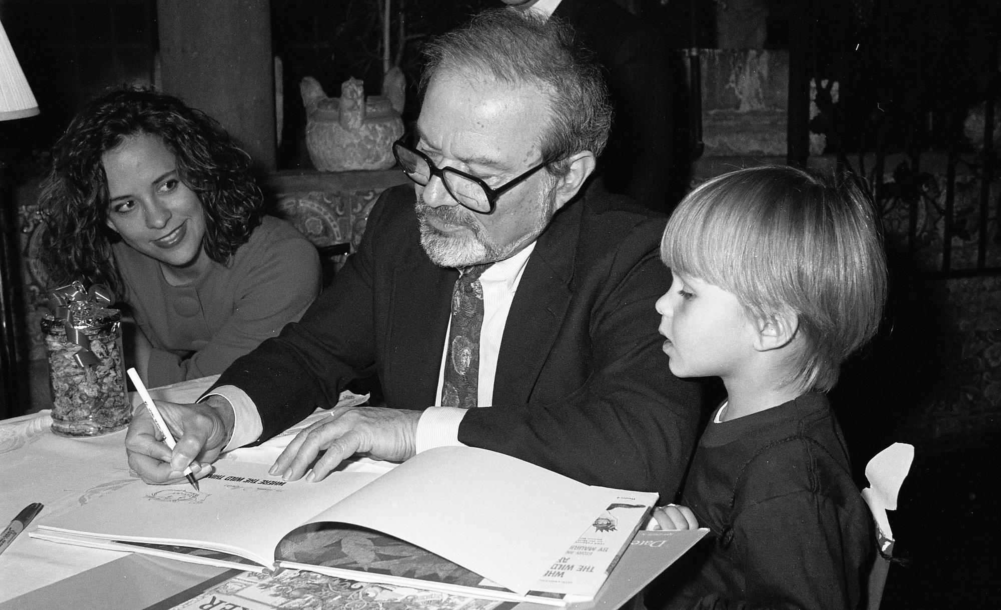 Maurice Sendak signs copies of his books for eager fans