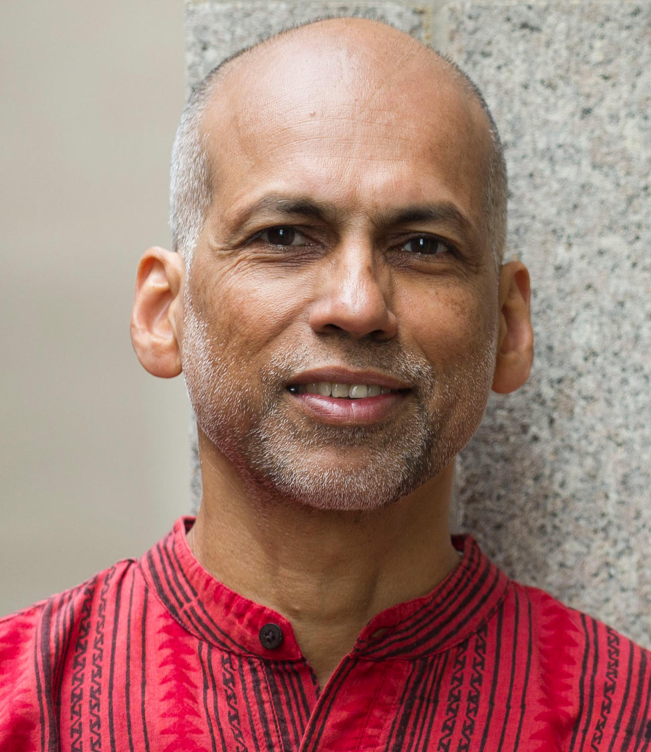 Photo of man in red shirt