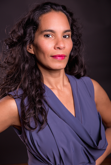 Headshot of woman wearing purple shirt