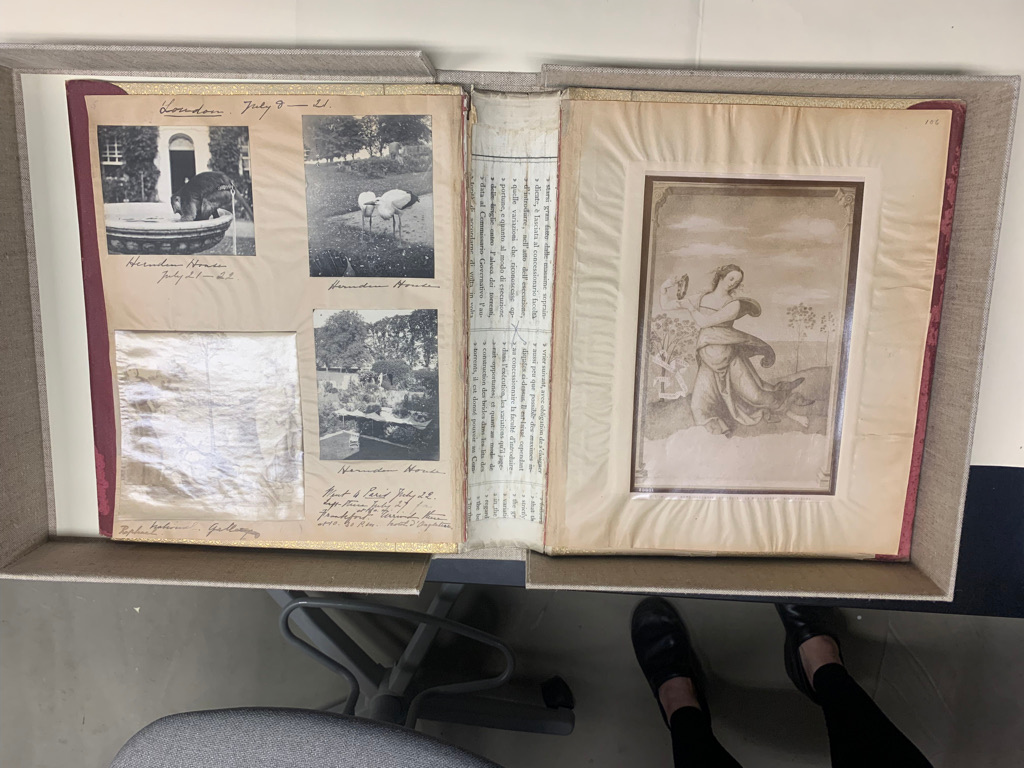 The open cover of a travel album without its interior pages. Photographs are collaged on the interior sides with pen and ink annotations in Isabella Stewart Gardner’s hand.