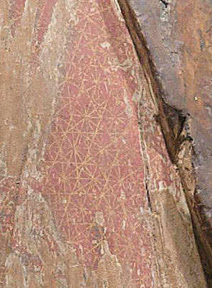 Detail of red pants on Guanyin, with fine geometric network of gold kirikane decoration.  