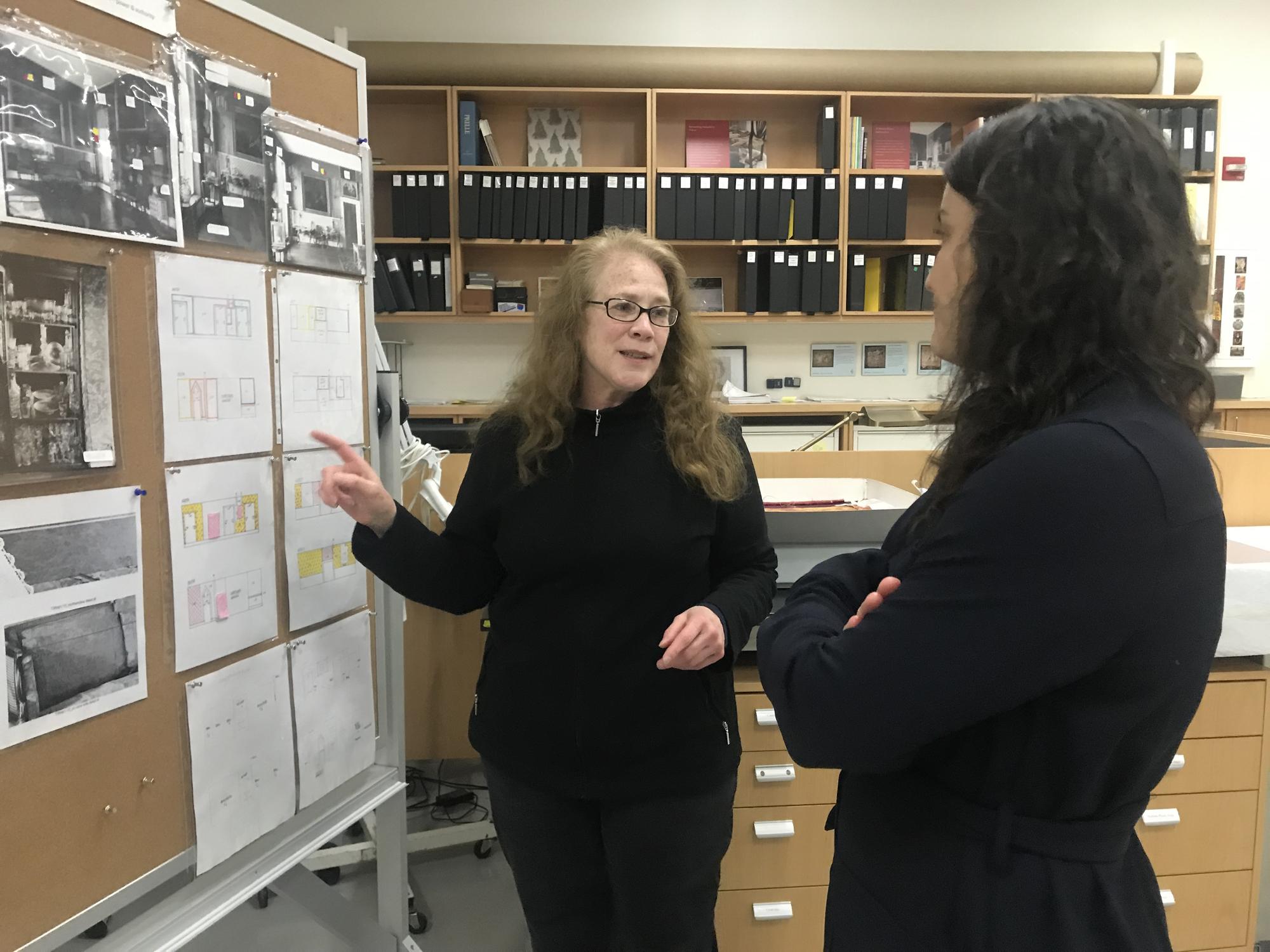 Textile Conservator, Tess Fredette walks Nicole Cherubini through her research on the Titian Room wall fabrics, 2019
