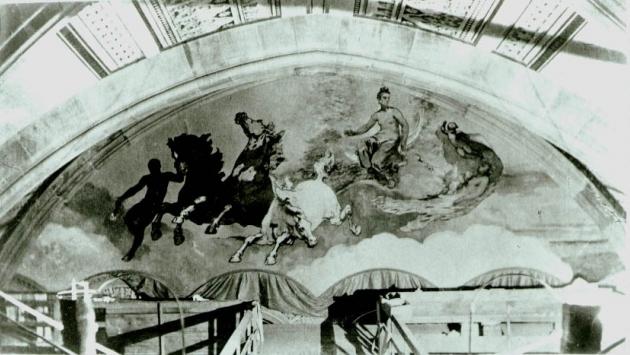  Black and white photograph of a semi-circular painted mural of three horses pulling Anahita’s chariot. 