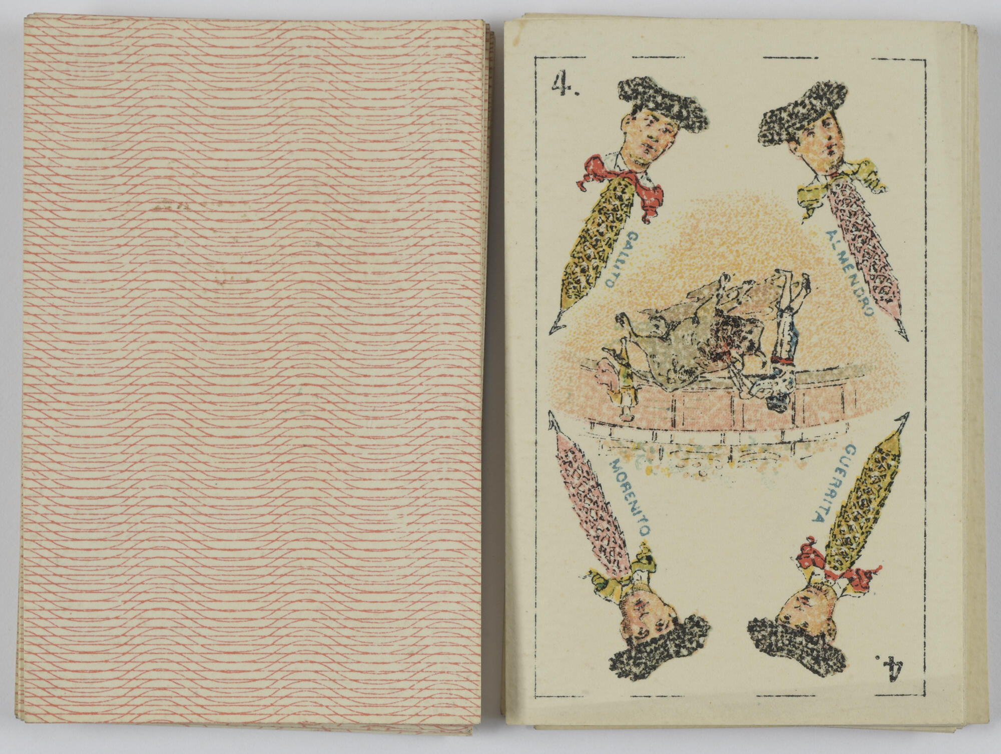 An overhead view of the back of a playing card, decorated with a red stripe and wave pattern, and the front of the number four playing card from the same deck, showing a bullfighting scene, surrounded by the heads of four matadors.