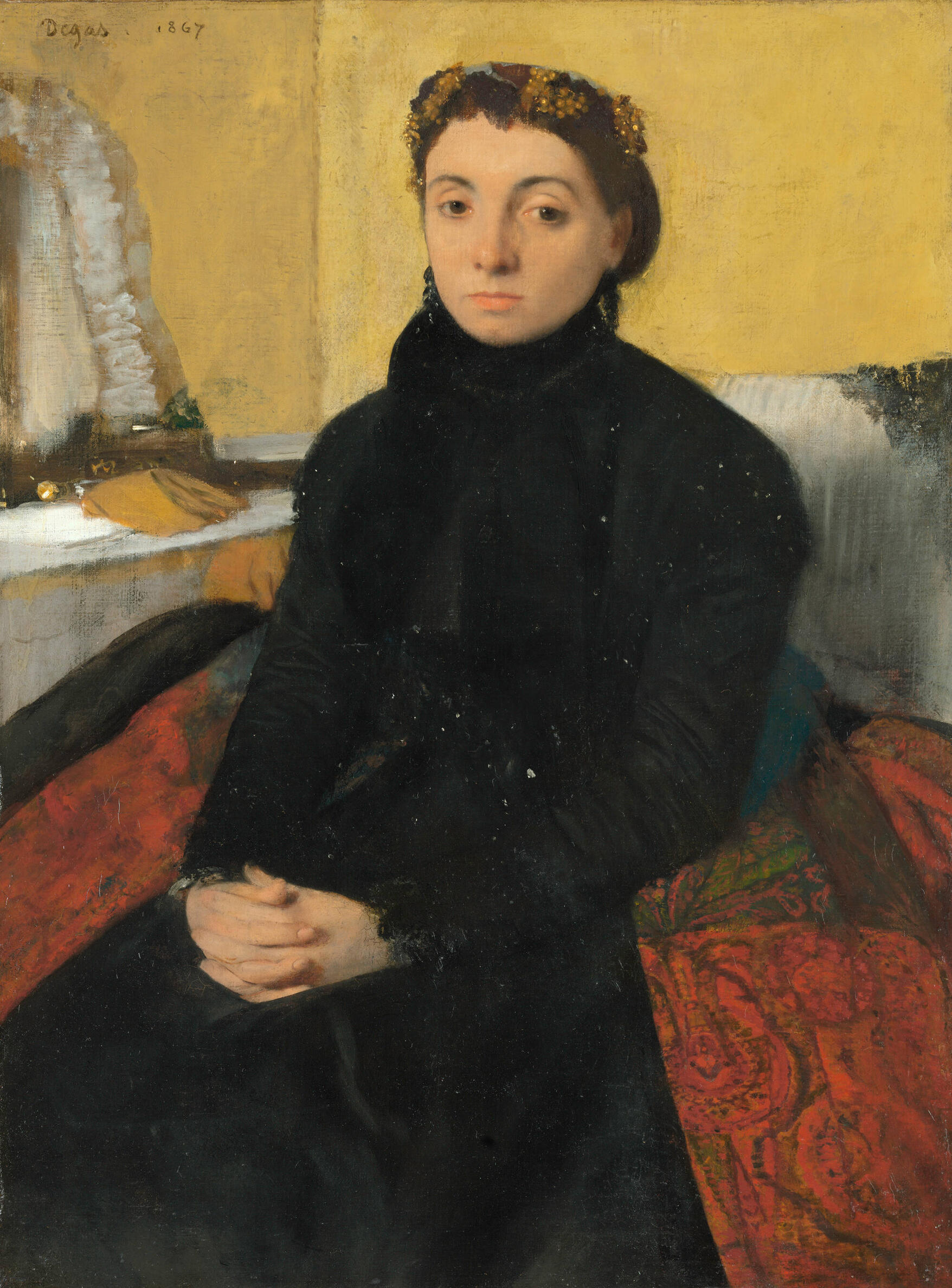 A painted portrait of a seated woman dressed in black in a room with yellow walls. She has light skin and dark hair and has her hands folded in her lap.
