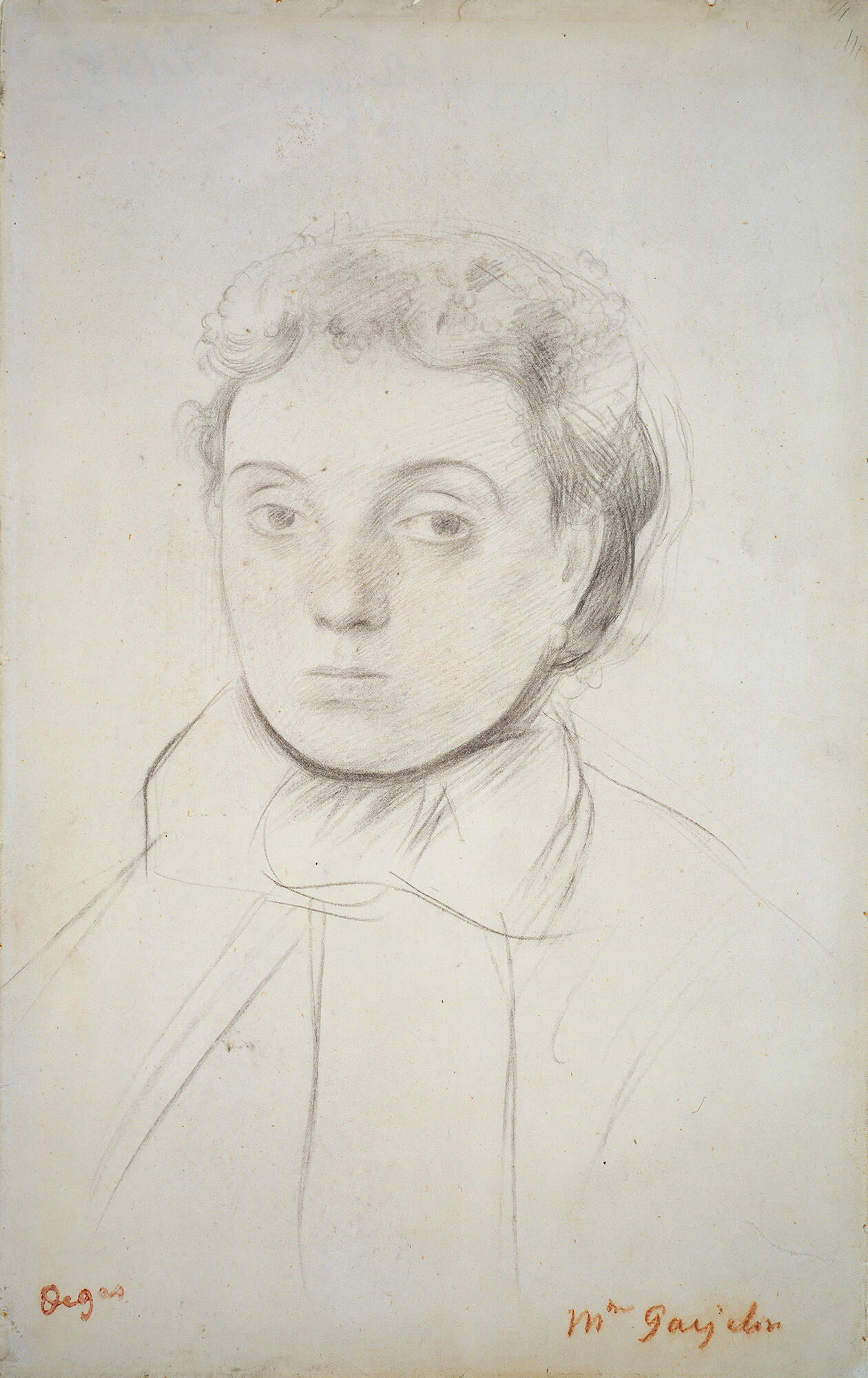 A drawing of a woman’s head and shoulders. Mme Gaujelin is inscribed in red pencil at the bottom right corner of the page.