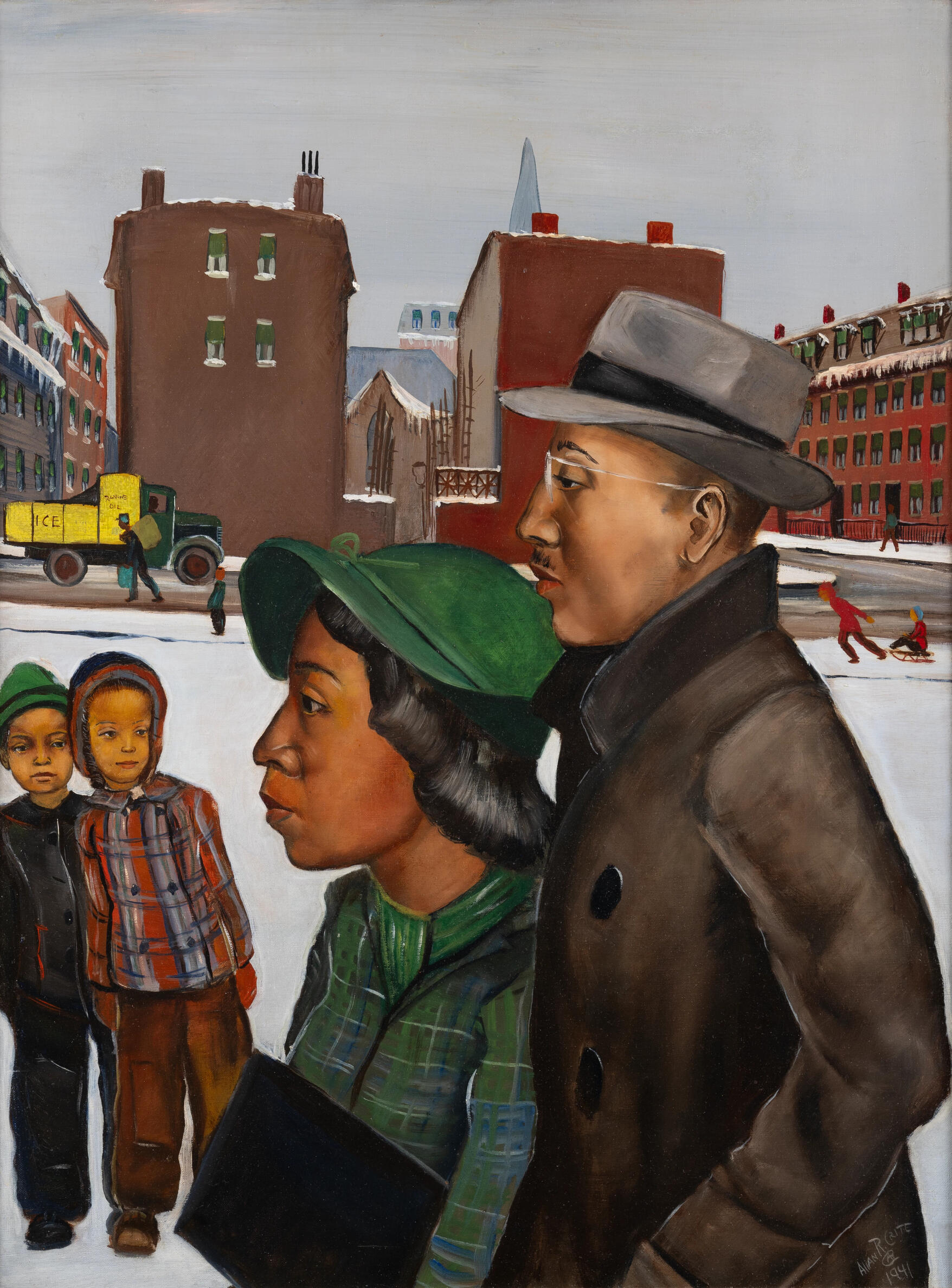An African American man and woman in winter coats and hats walking past two young children on a snow covered street with large brick buildings behind them. 
