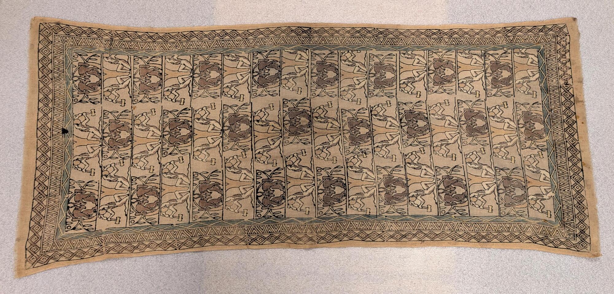 A rectangular piece of cotton with a printed pattern.