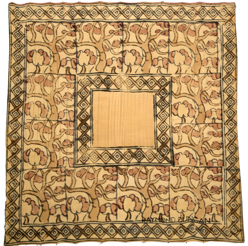 A square silk scarf with a tree pattern.