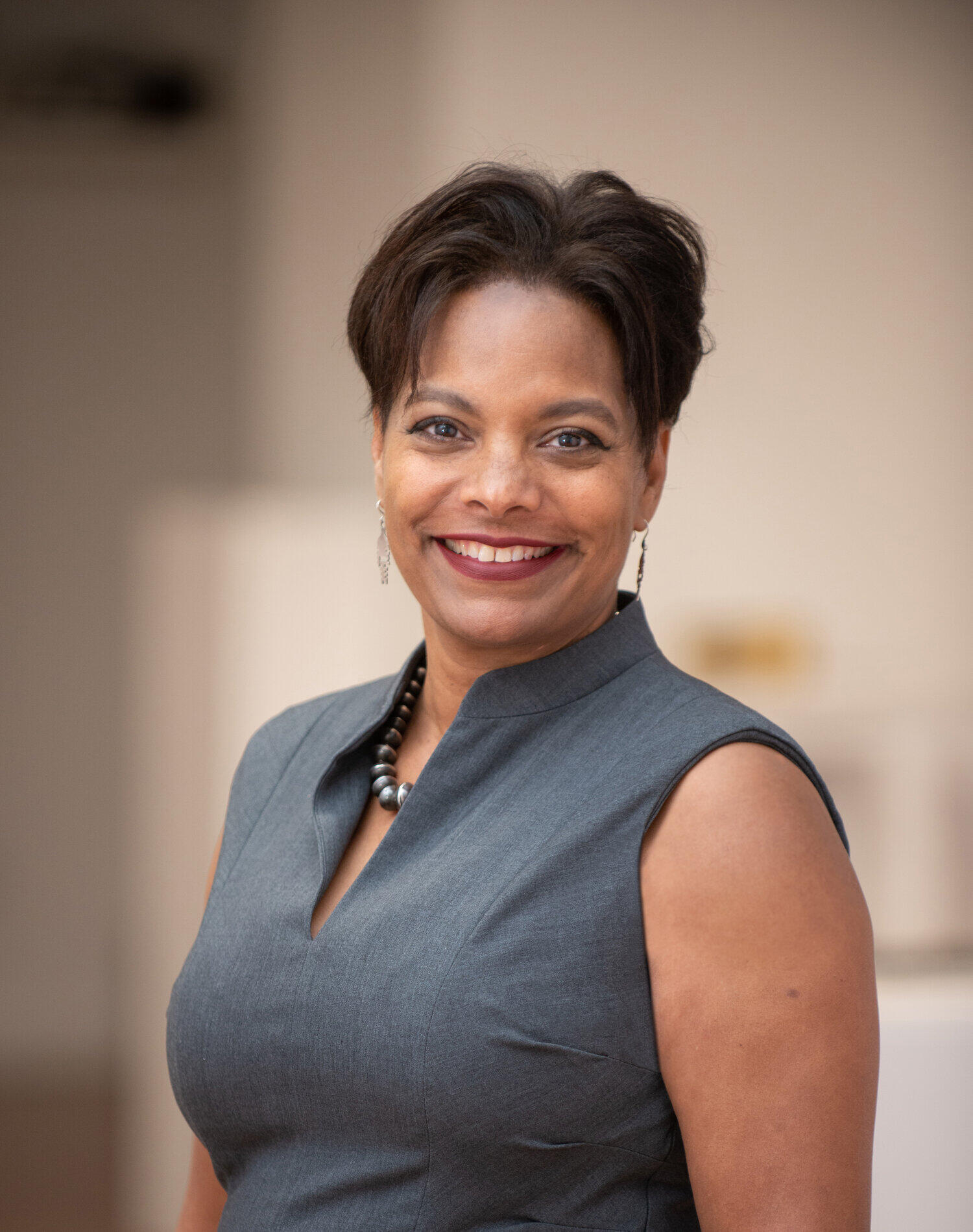 Fair skin African American woman with short dark dia a 