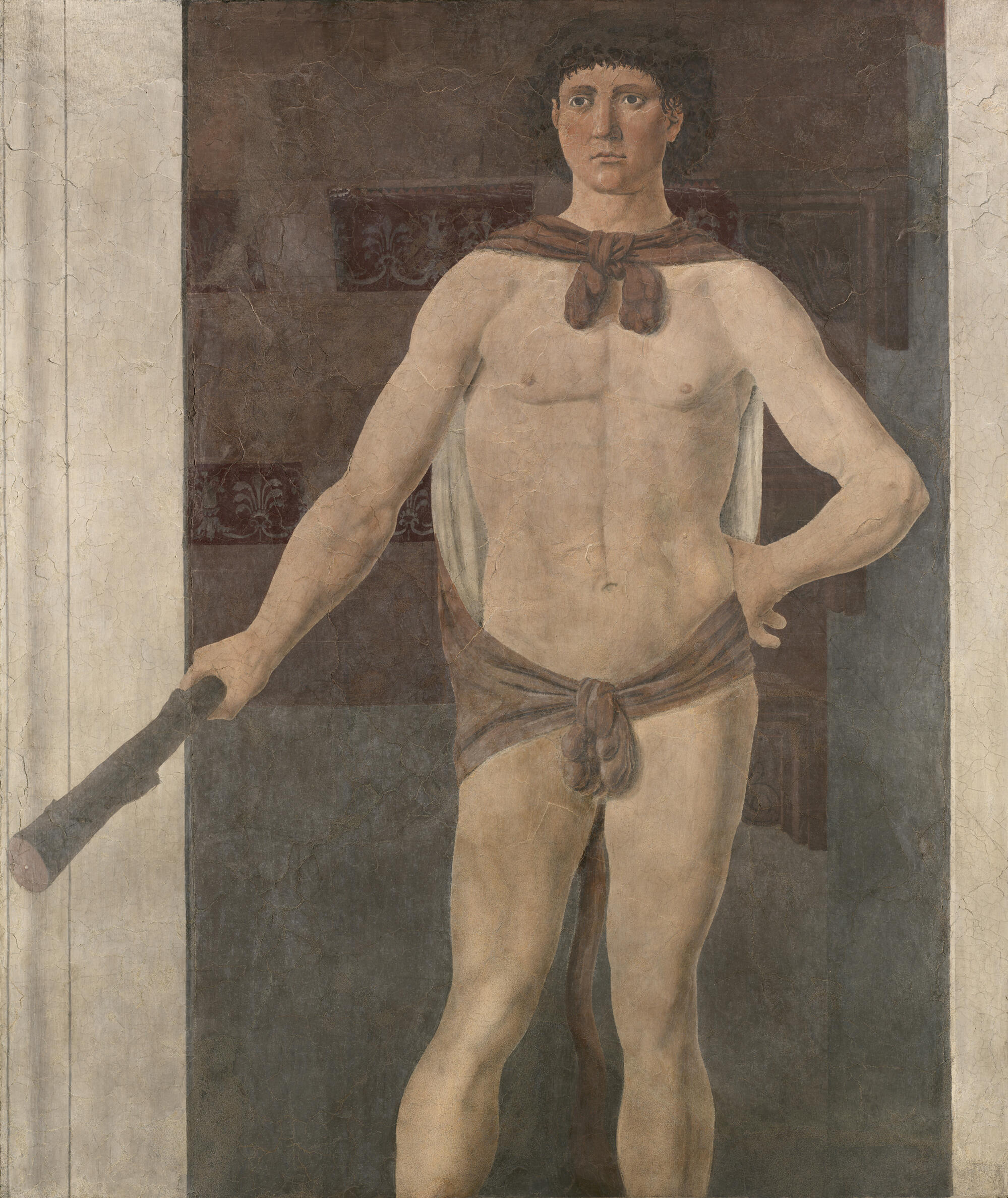 A fresco of Hercules wearing a lion cloak holding a wooden club.