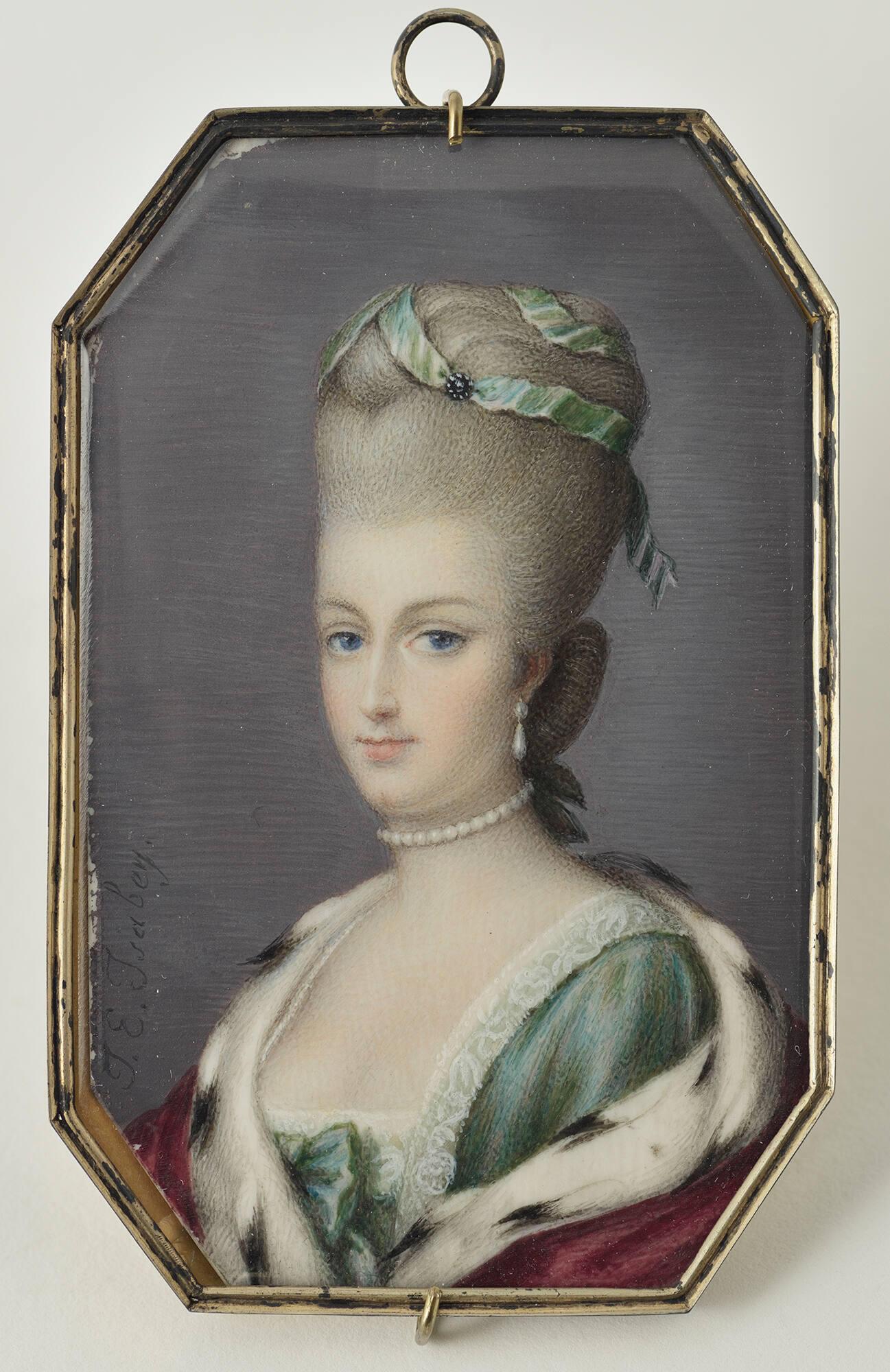 A bust length portrait of a young white woman with an elaborate gray wig and sumptuous clothes.