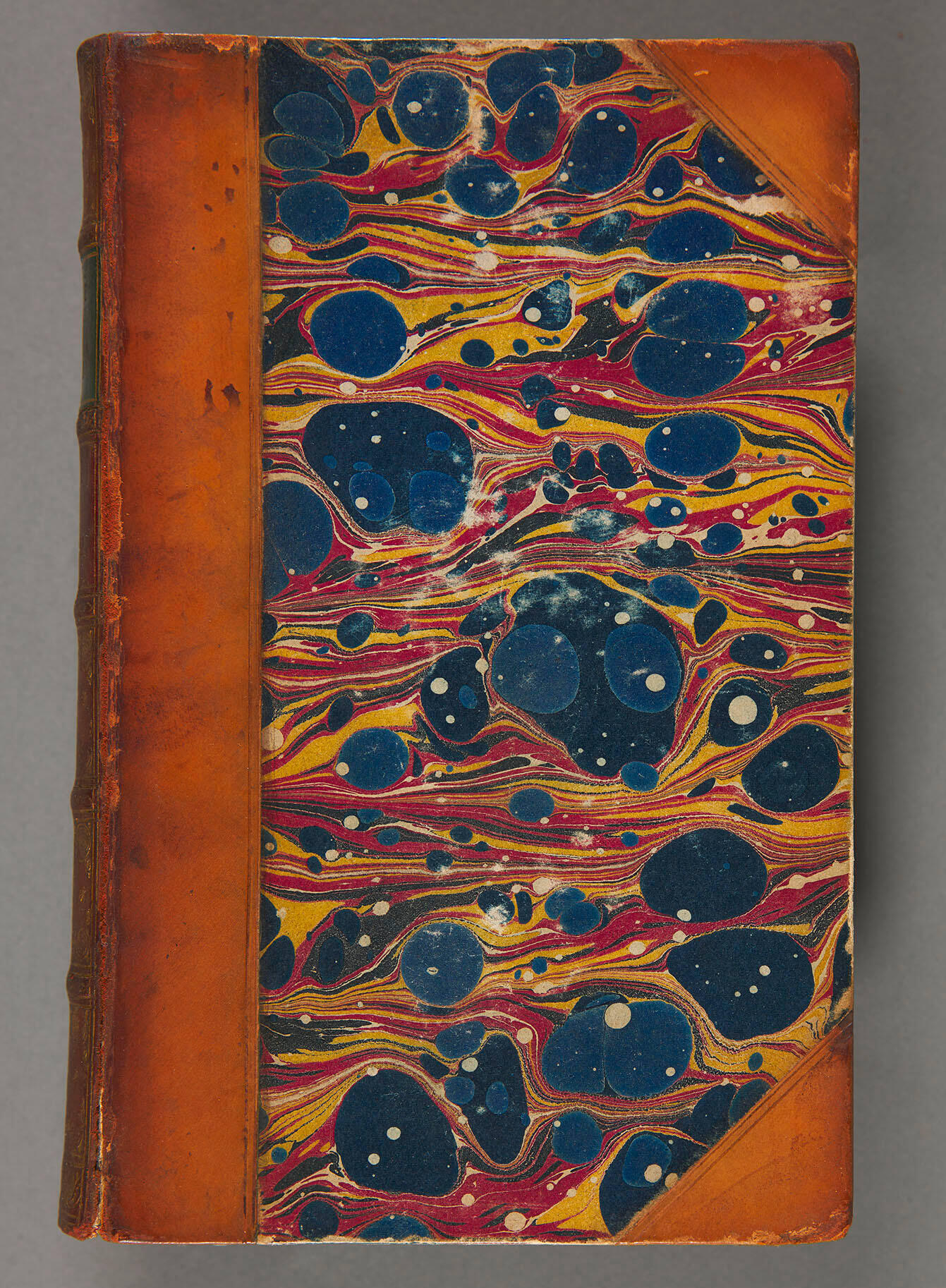 A book with a marbled paper cover