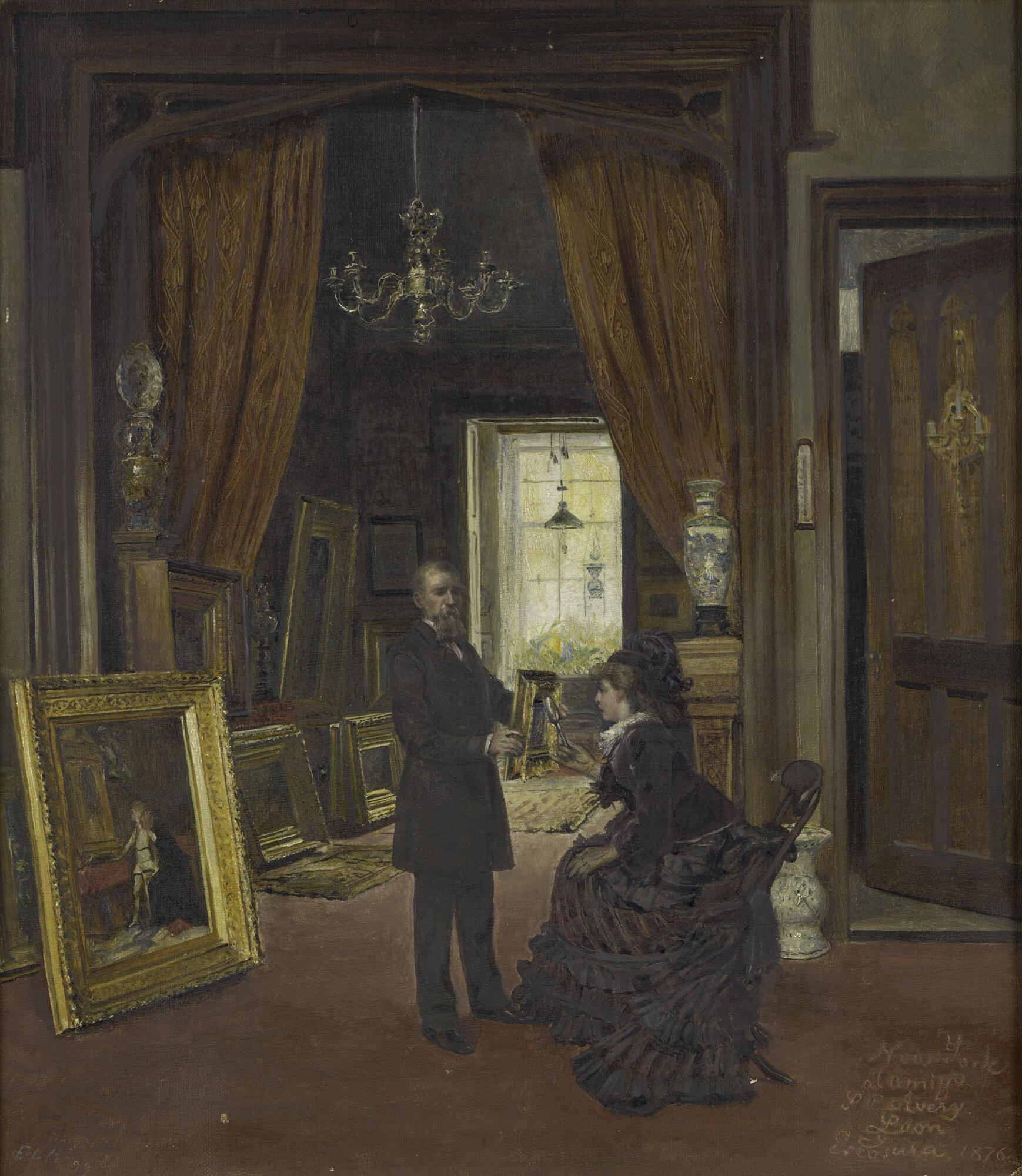 A painting of a seated woman looking with a magnifying glass at a painting held by a standing man in an interior filled with pictures.