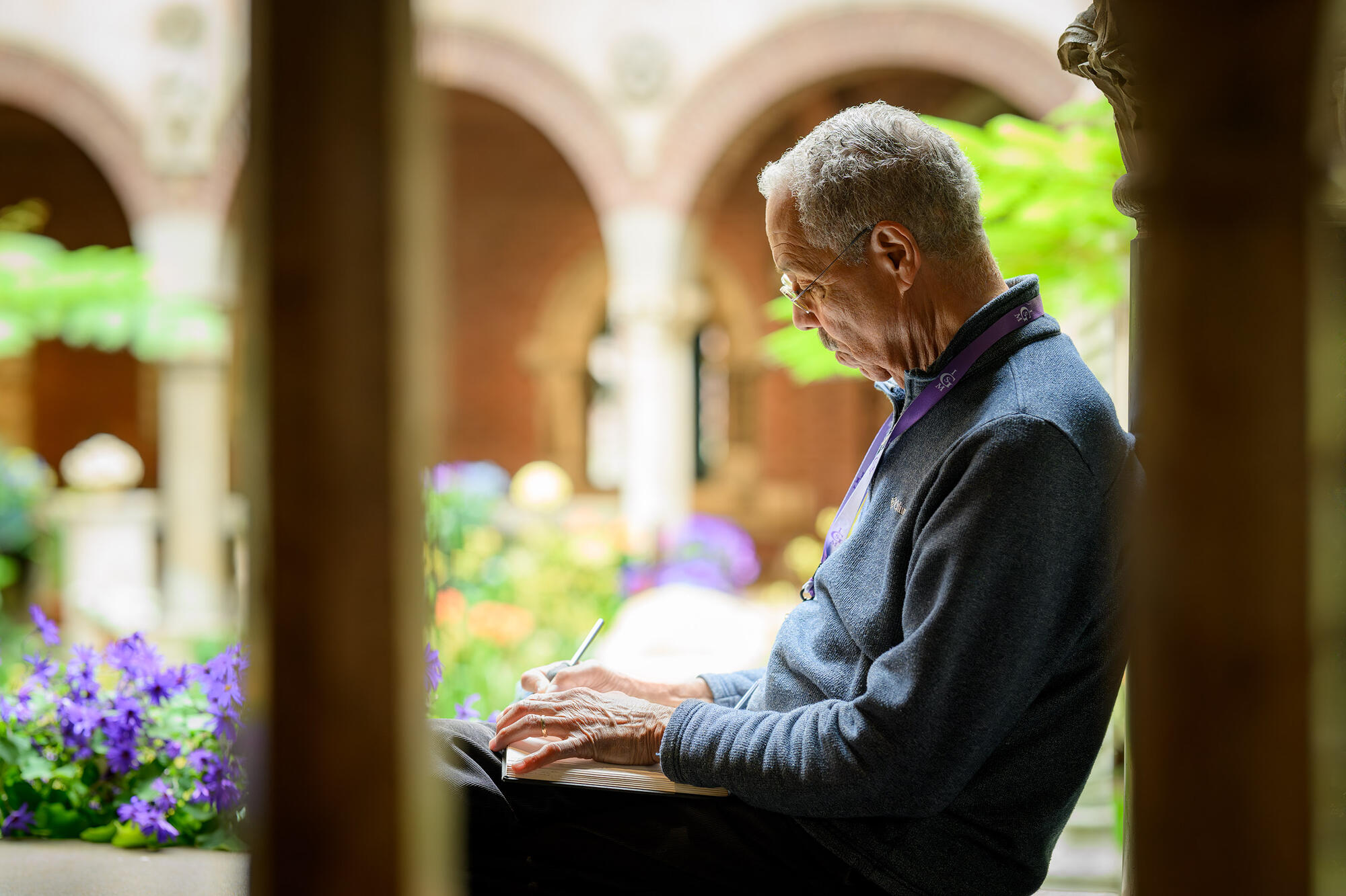 Robert T. Freeman drawing in the Courtyard