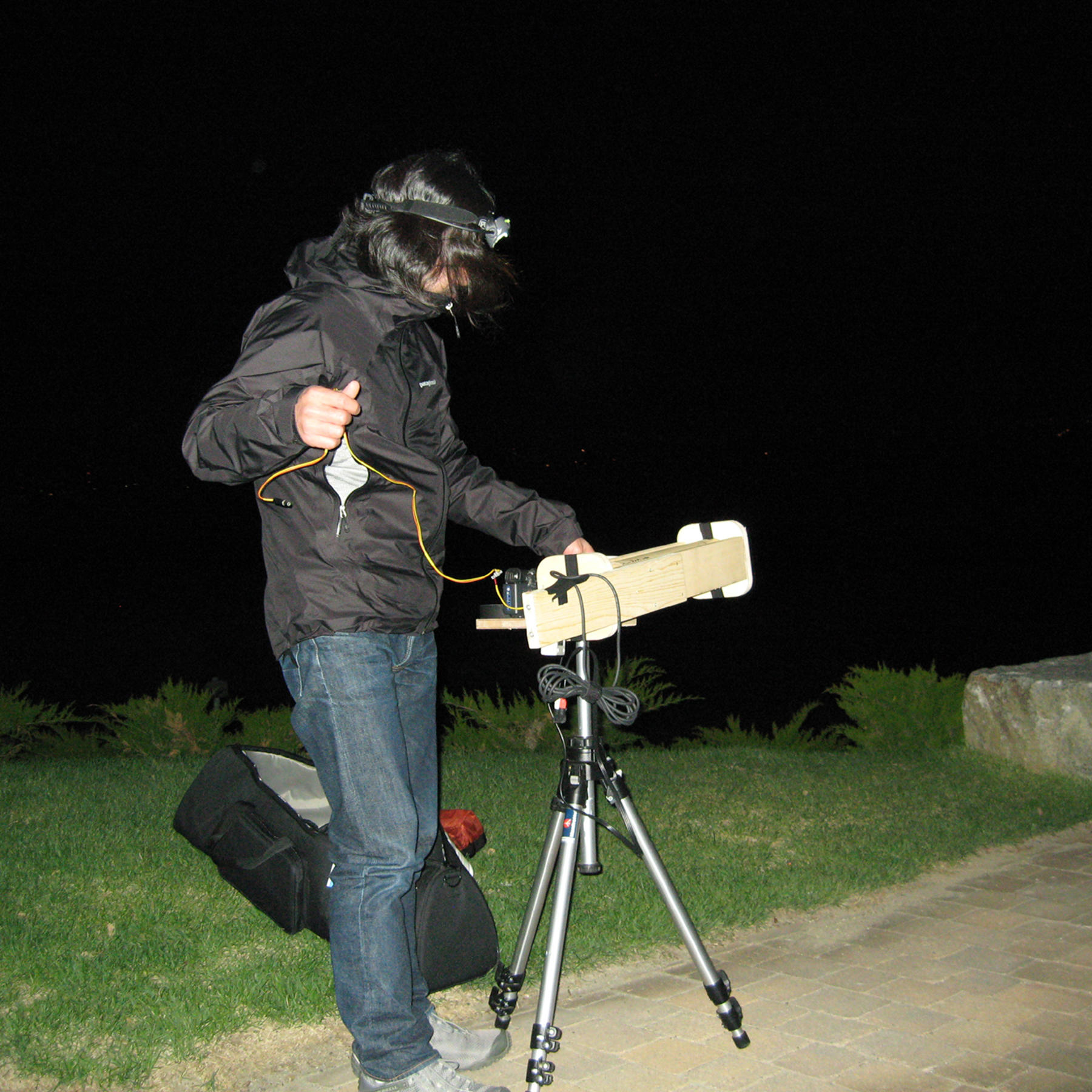 Taro Shinoda filming the moon and Boston with the telescope he built, 2007.