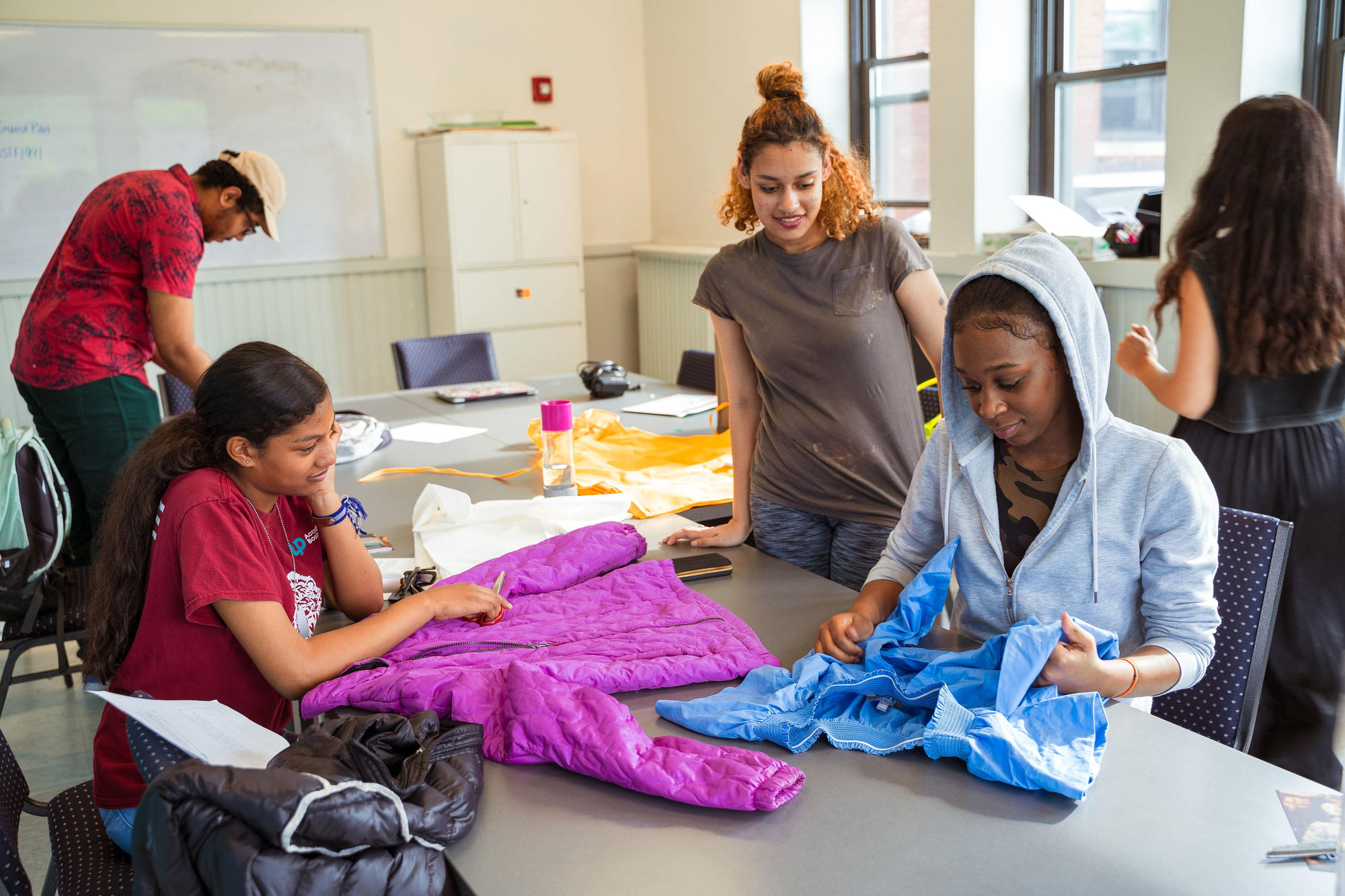 Hyde Square Task Force students work on their Map This garments. Photo by Faizal Westcott, June 2019.