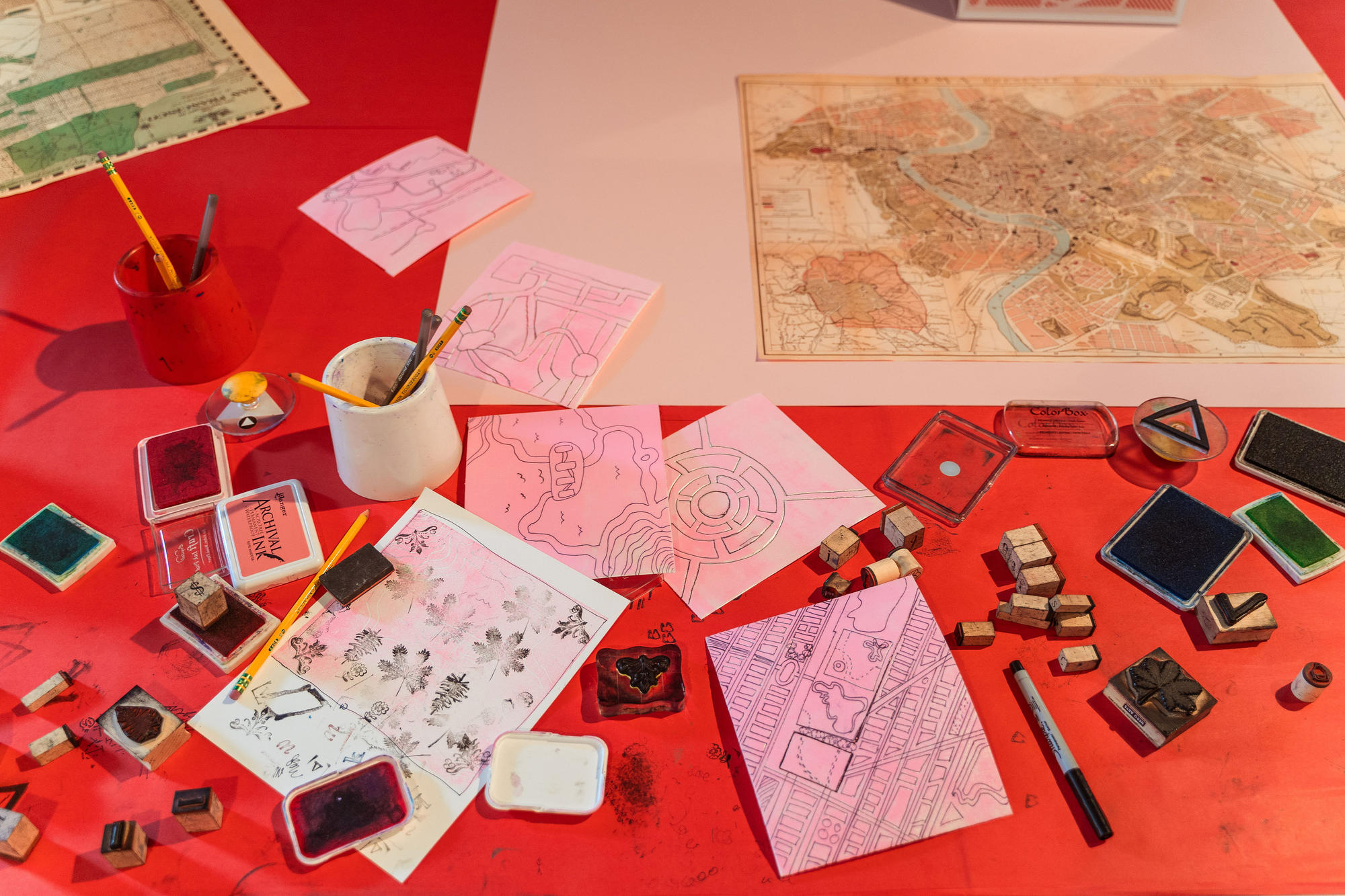 Close up of a Studio table during Anthony Peña's Mapping a Better Future project in summer 2019.